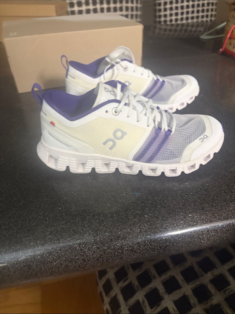 On Running Women's Cloudrunner Athletic Shoe in White and Purple